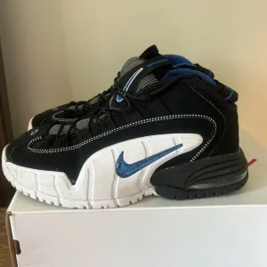 Nike Black and White Sneakers with Blue Accents- PENNYS