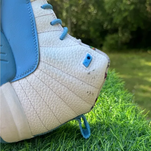 Nike Jordan 12 Retro PS Emoji sneakers.