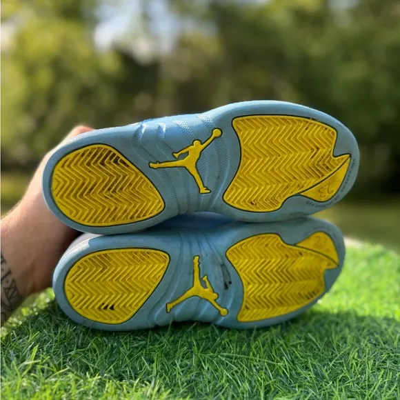 Nike Jordan 12 Retro PS Emoji sneakers.