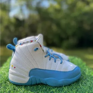 Nike Jordan 12 Retro PS Emoji sneakers.