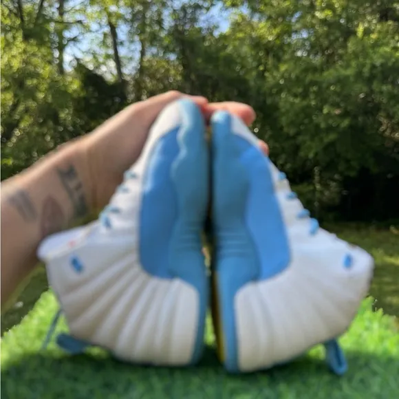 Nike Jordan 12 Retro PS Emoji sneakers.