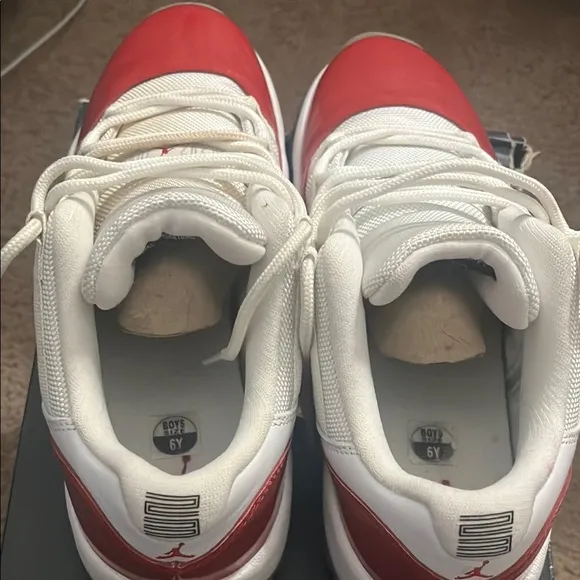 Red and White Jordan 11 Sneaker