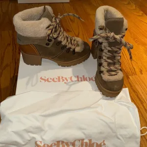 See By Chloe shearling hiker boots worn 1x for maybe an hour so basically new