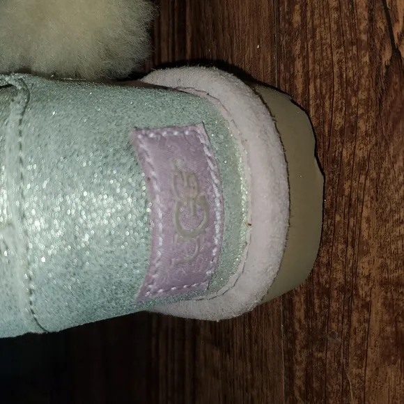 UGG Gita Cream Fur Pom Silver Metallic Leather/Lilac  Shearling Boots r Size 7