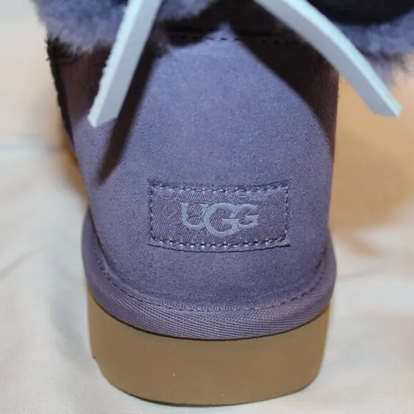 UGG WOMEN'S MINI BAILEY BOW SUEDE‎ SHEARLING LINED ANKLE BOOTS PURPLE