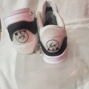 White and Black Sneakers with Unique Design