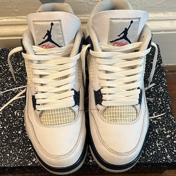 White and Gray Sneakers with Blue Accents