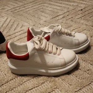 White and Red Sneakers