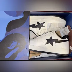 White Sneakers with Black Star Design