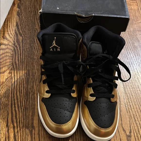 Worn 2x Air Jordan Black and Gold Sneakers size 6 kids.