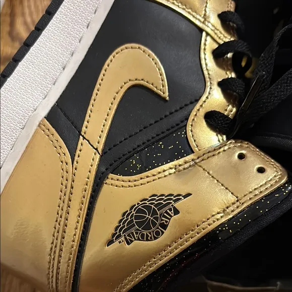Worn 2x Air Jordan Black and Gold Sneakers size 6 kids.