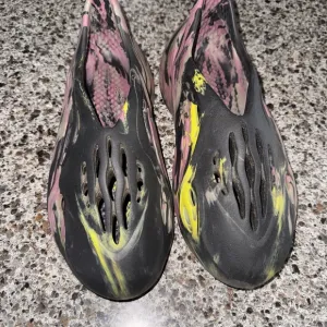 Yeezy Black and Purple Slip-On Loafers with Modern Design